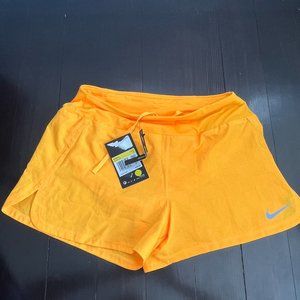 NWT Neon Orange Nike Dri fit running shorts w/ lining